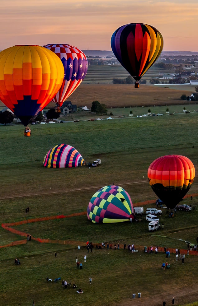 Colorful hot air balloons taking off during a festival at Wvec West Valley Events Complex, Phoenix, Arizona.